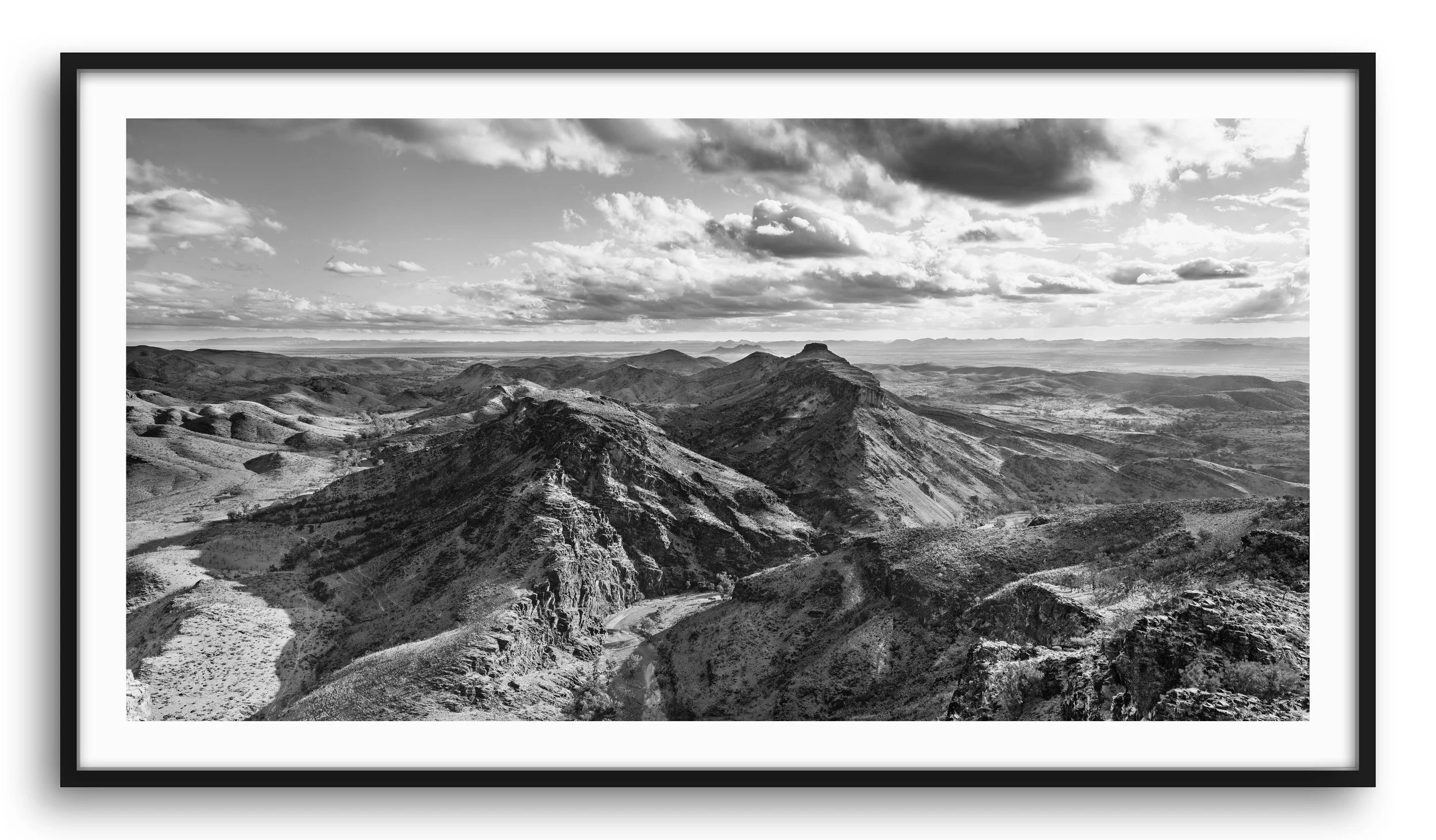 "GRAVITY " Series This series captures the raw beauty of the Flinders Ranges in South Australia and the confronting nature of its scale in time. With a geological history that is as old as complex life on earth, the landscape and it’s duration prompts us to explore the idea of our own brief flash of existence. The revolutions of our earth within the universe and the erosion of a prehistoric mountain range are created by the forces of gravity that act throughout our universe and show us the ever changing nature of life. This landscape and it’s context gives us a perspective far greater than our own short life and inspires. Framed and unframed prints are available from $285.