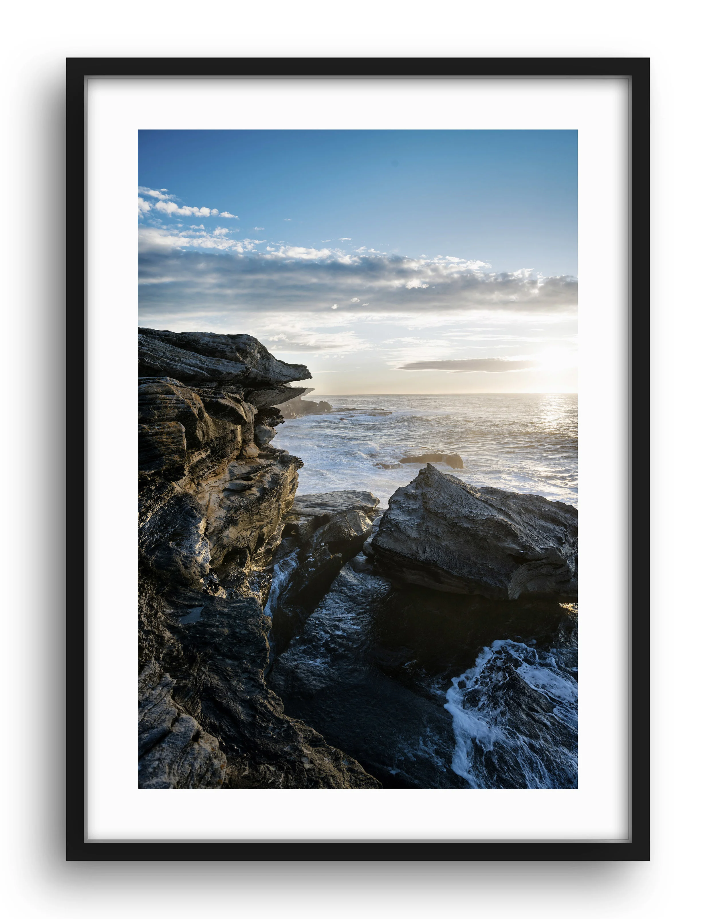 "COAST " Series This series shot around the Australian coast and focused near my home in Sydney shows the beauty of the fringes of the Australian continent. I’m often drawn to Rock formations that are like a giant sculpture carved by the powers of nature. I love waking up early and getting down to the beach to catch the first light or dawn. Watching the sun come up and the colours radiate across the sky as the light refracts through the earths atmosphere grounds us and gives us a greater understanding of our place within the universe. As the tide rushes in and out and the waves and winds carve the Coast it is nature that dominates. Framed and unframed prints are available from $285.