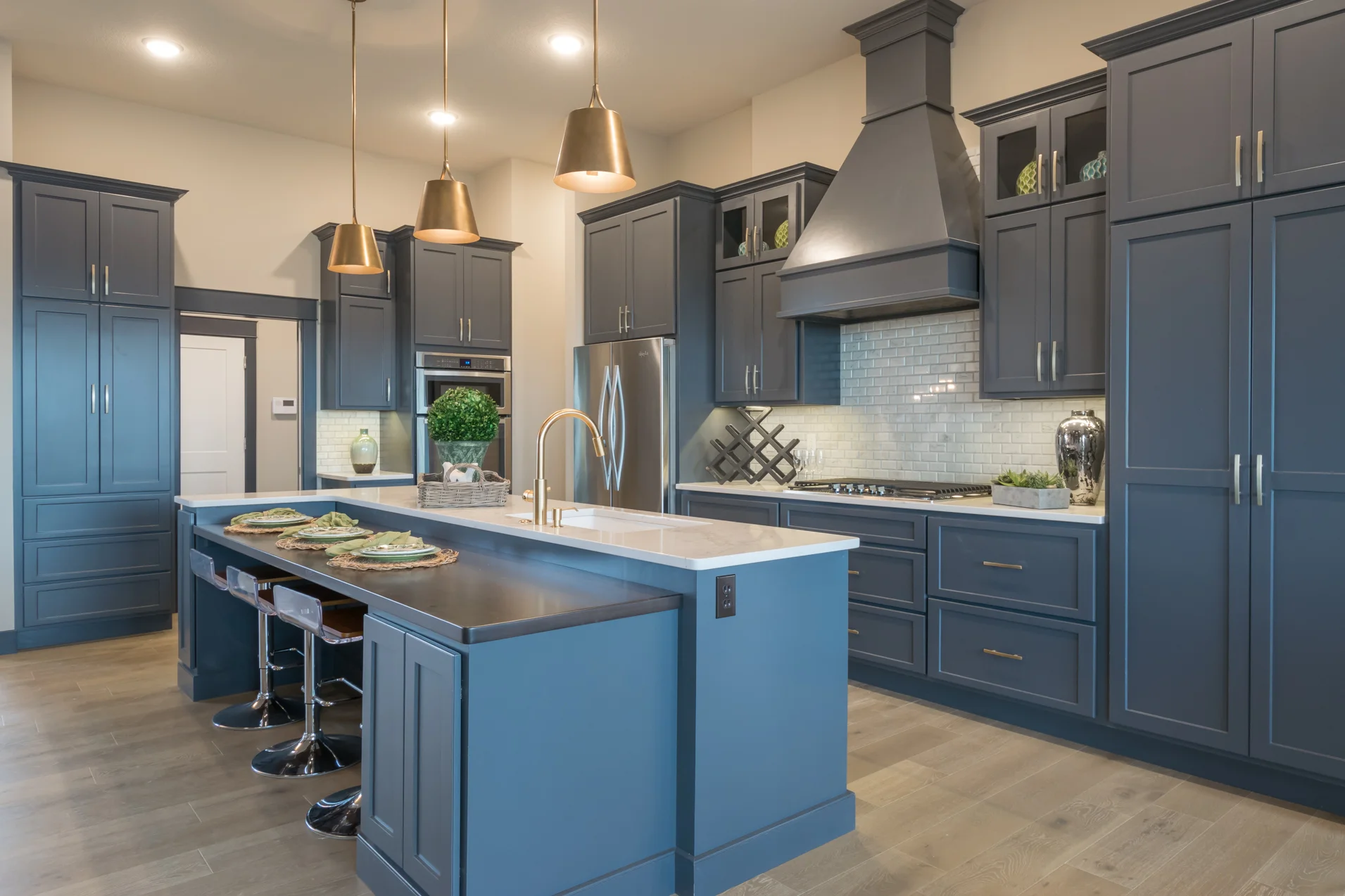 Our breakfast bar at our model home is the perfect space to finish up any school work!