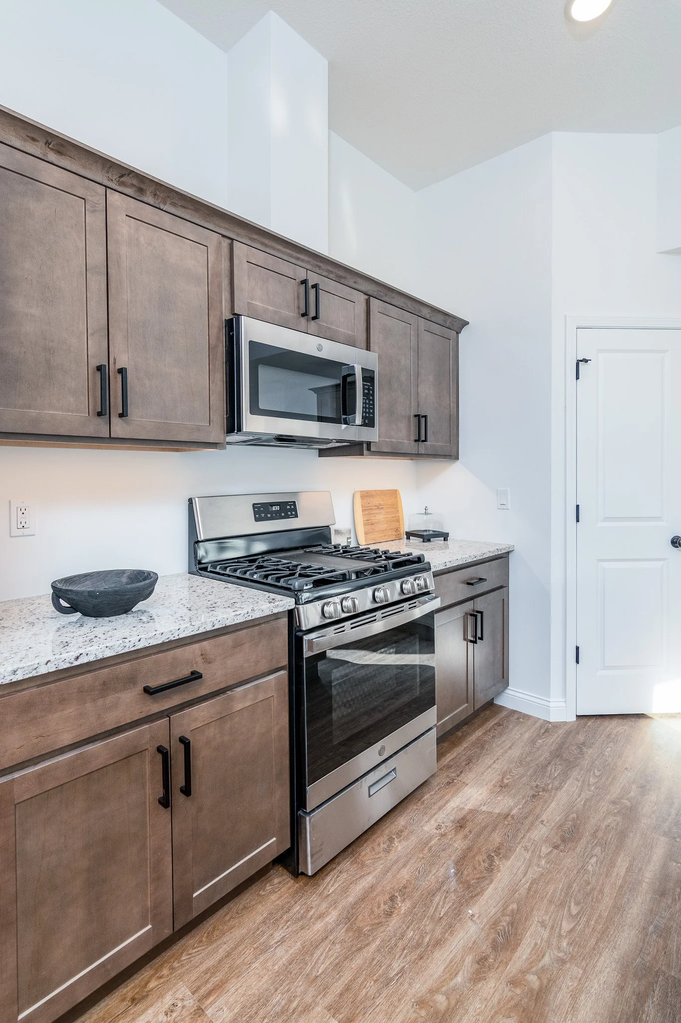 dark cabinets with gas stove.jpg