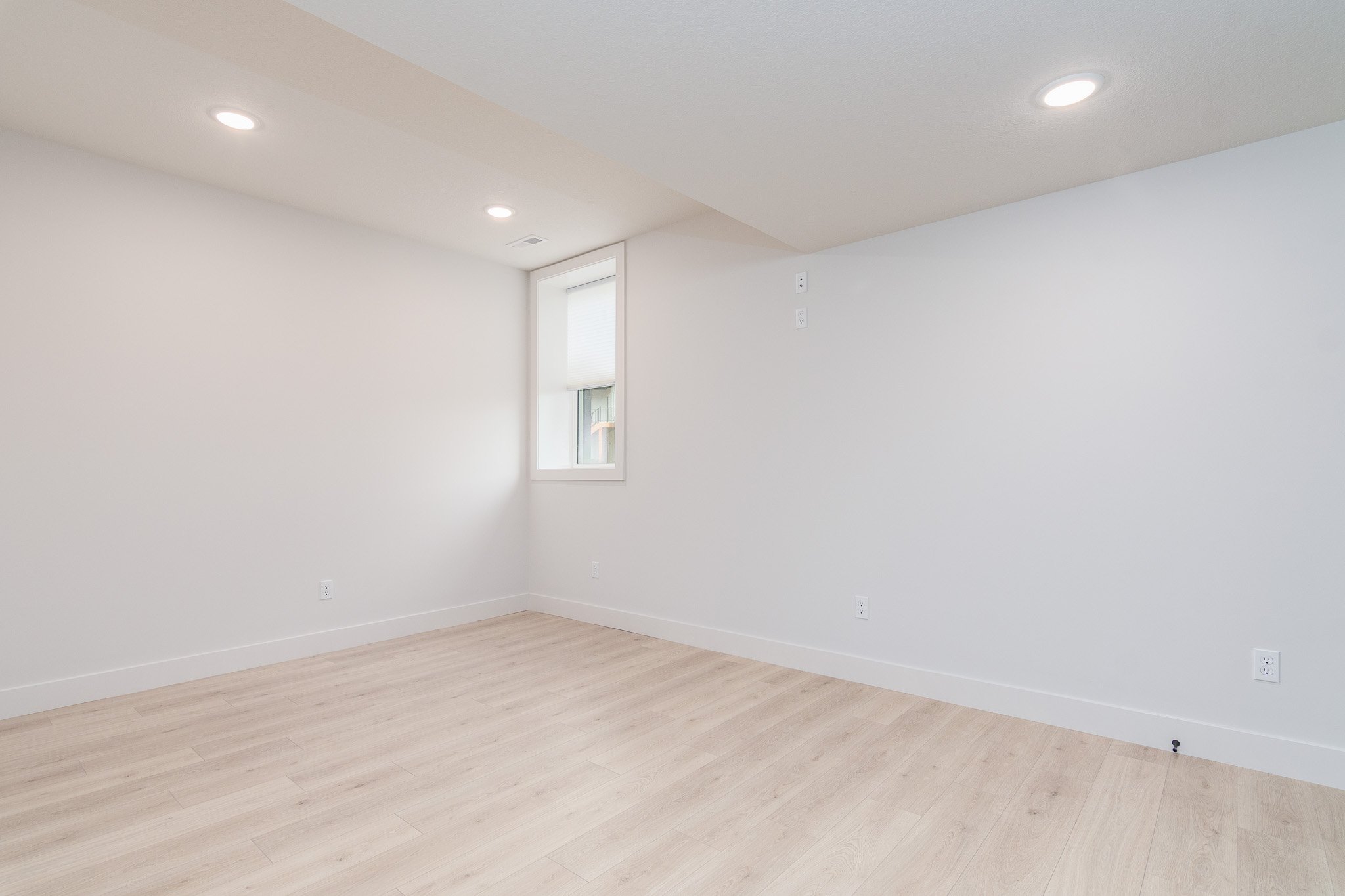 basement-bedroom-wood-floor.jpg