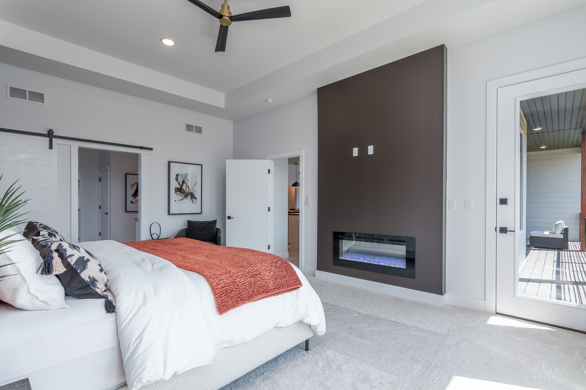 master-bedroom-with-fireplace-walk-out-balcony.jpg
