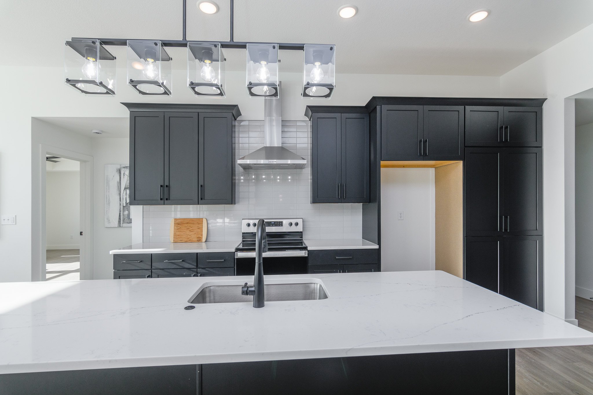 Large kitchen - black cabients - new home for sale.jpg
