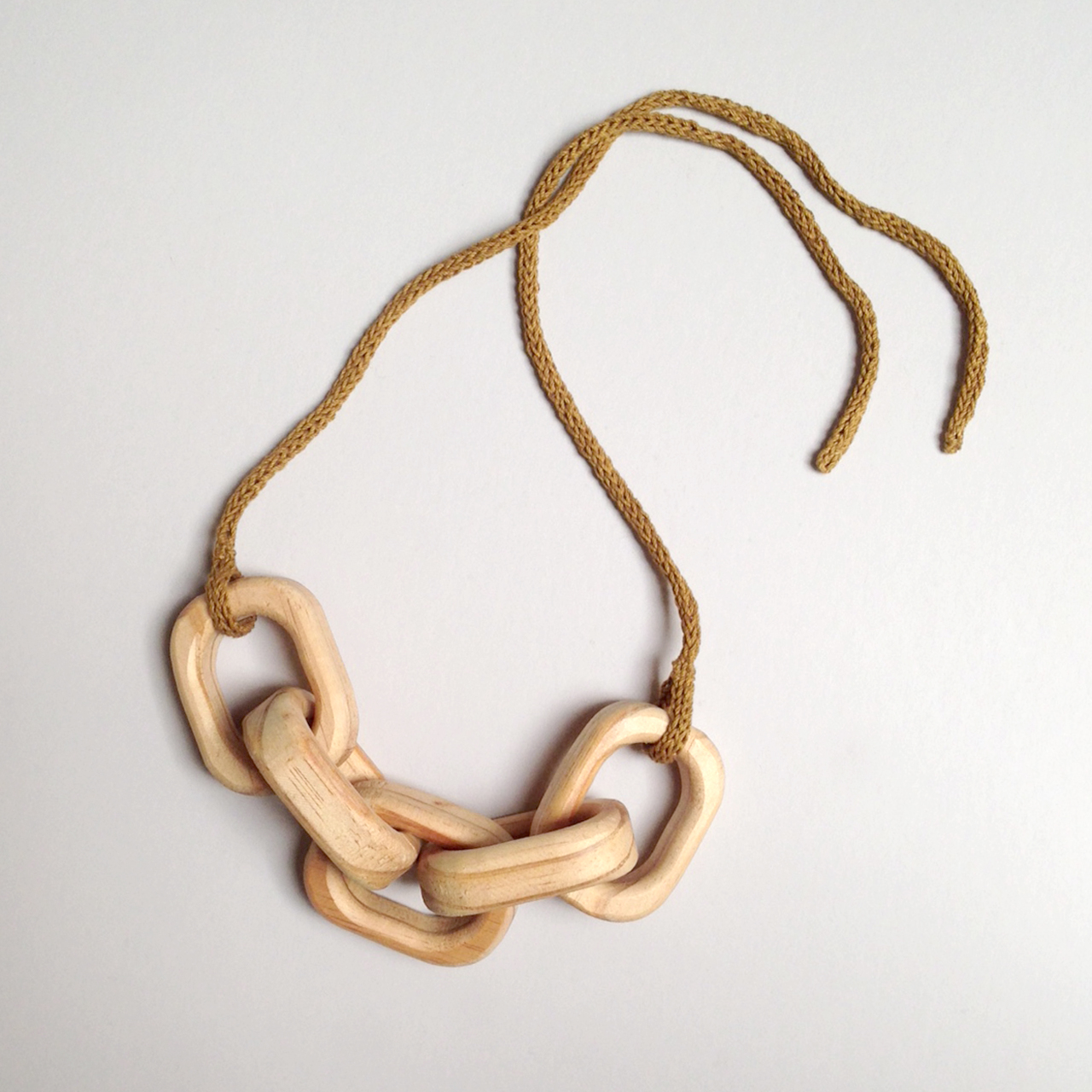 erica sandgren handmade timber necklace falling for florin