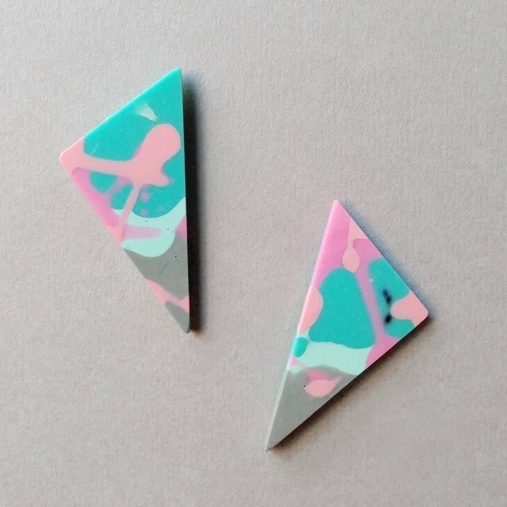 flock curiosity triangle resin earrings falling for florin