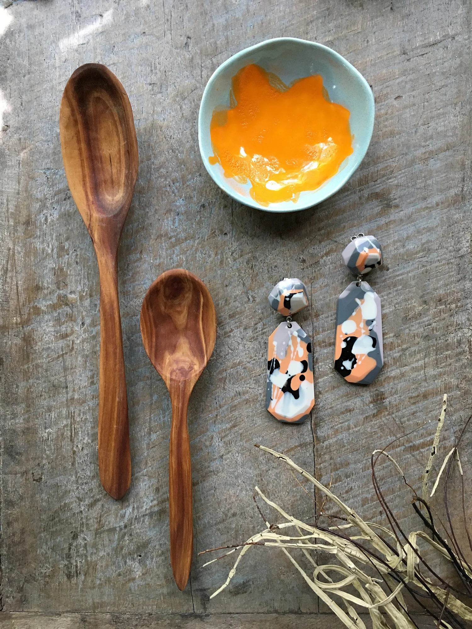 timber utensils - elk craft / resin earrings - flock curiosity assembly / ceramic dish - elnaz nourizadeh