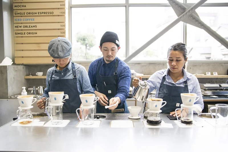 Baristas making coffee