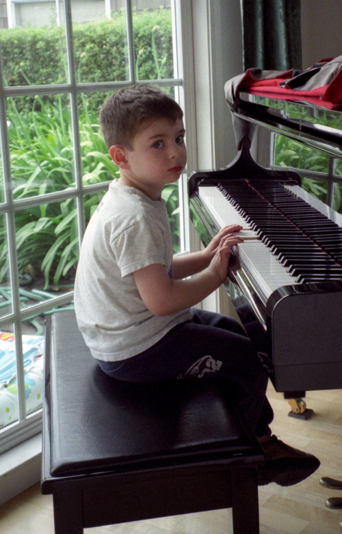 Justin at piano.jpg