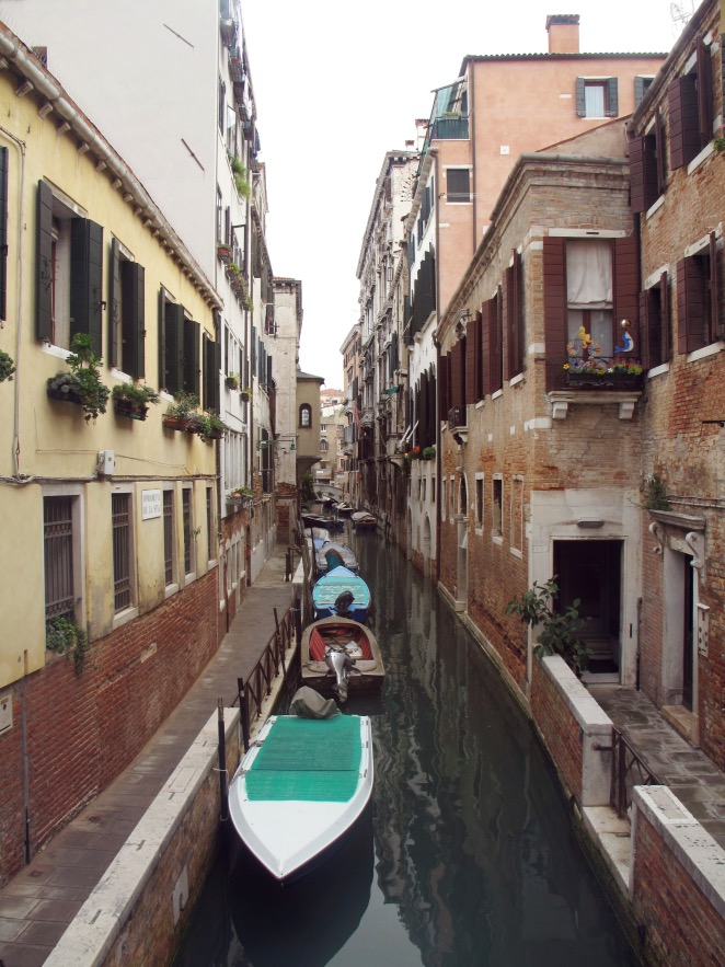 Venice_boat lined canal.JPG