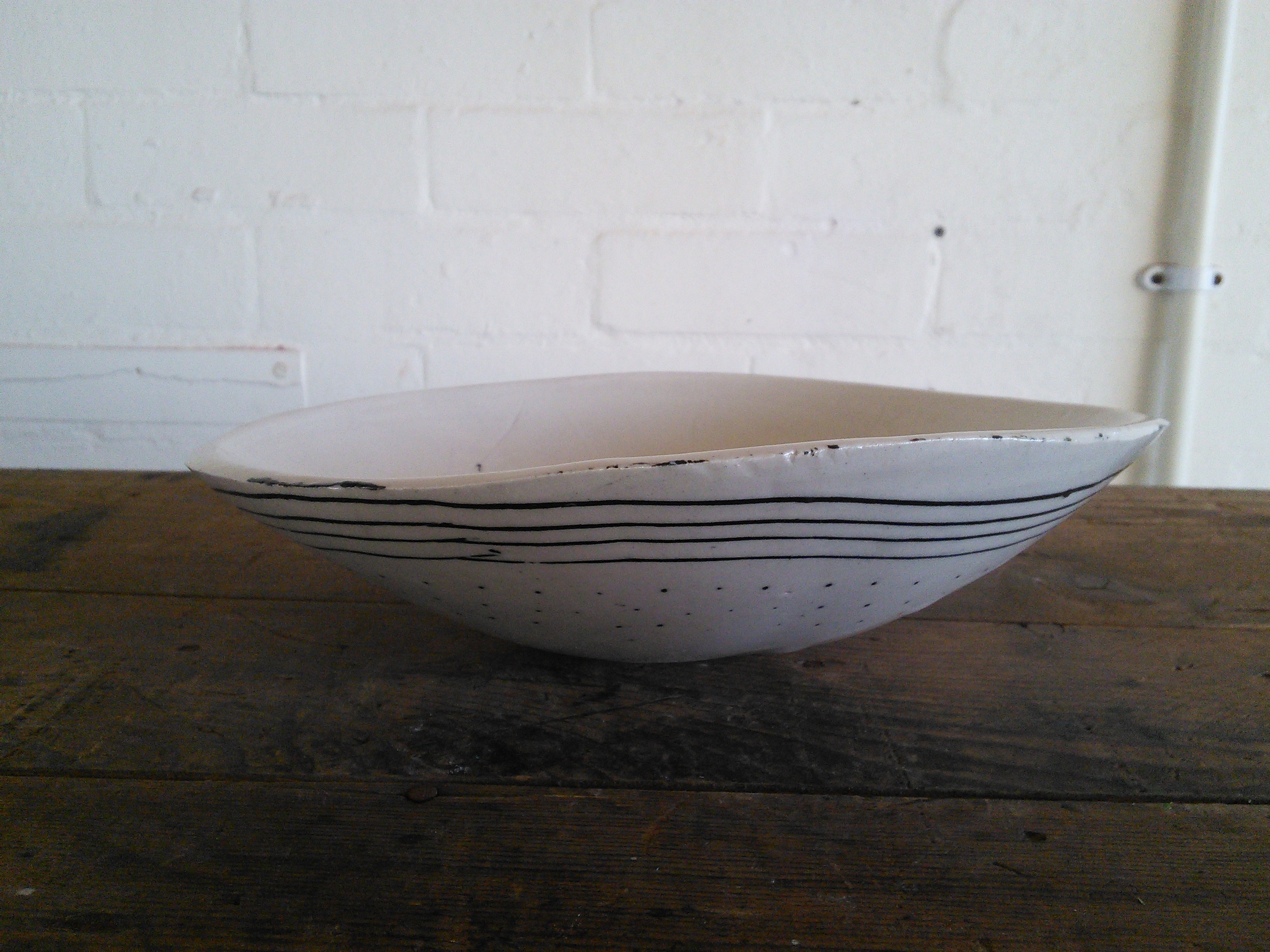 Moulded slab bowl with inlaid design, F