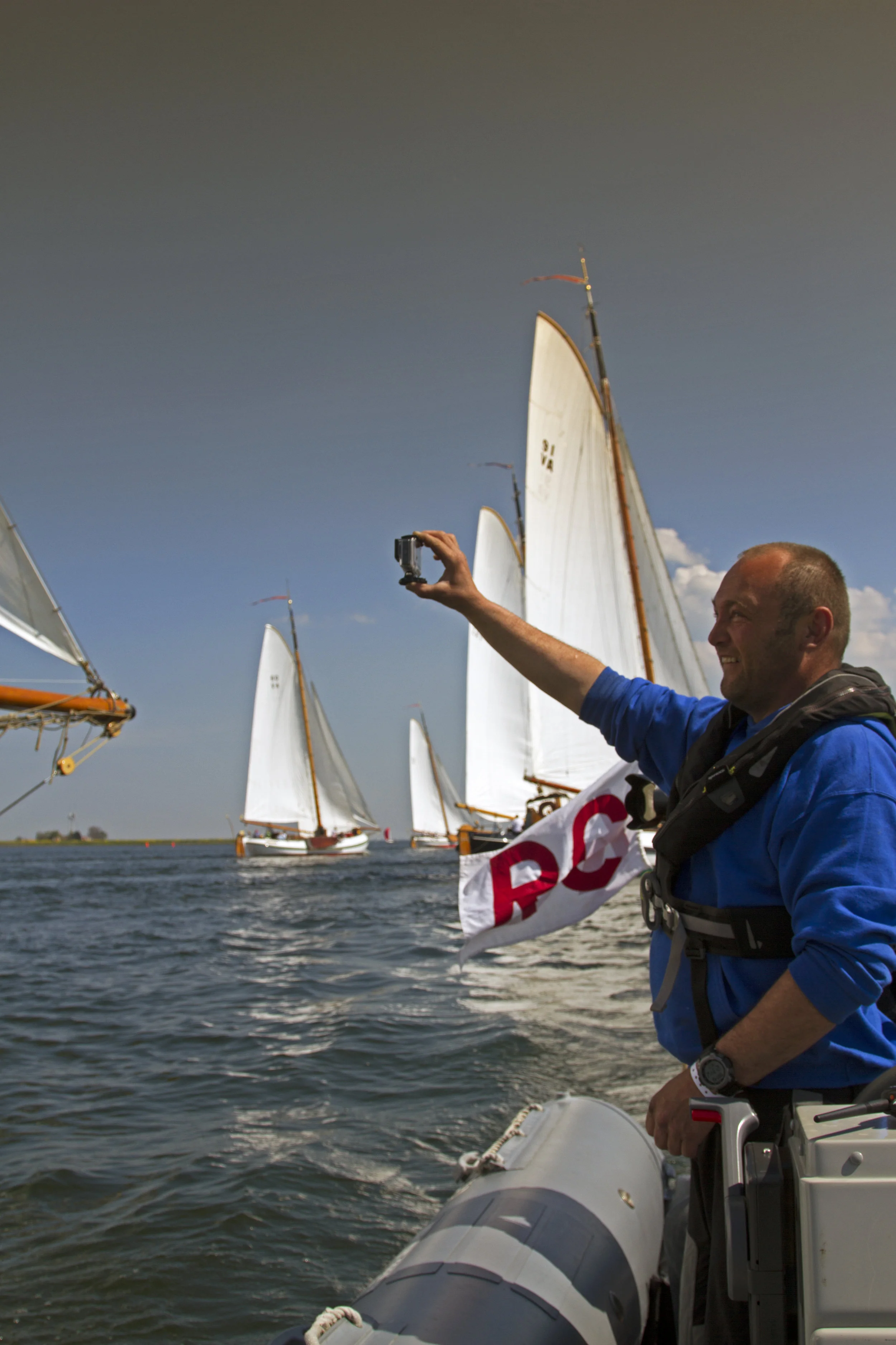 Photographing the boats "Lemsteraken" from a distance, a couple of meters from the race committee RIB.