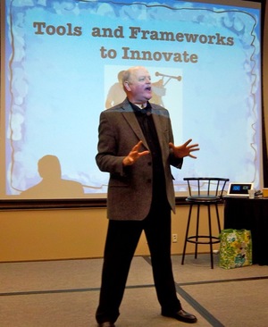 GREGG FRALEY ONSTAGE IN FEBRUARY 2013 ADDRESSING THE COLORADO CHAPTER OF AMERICA'S NATIONAL SPEAKERS ASSOCIATION. GREGG IS A SOUGHT-AFTER SPEAKER KNOWN INTERNATIONALLY FROM BELARUS AND BRAZIL TO THE UK AND USA.