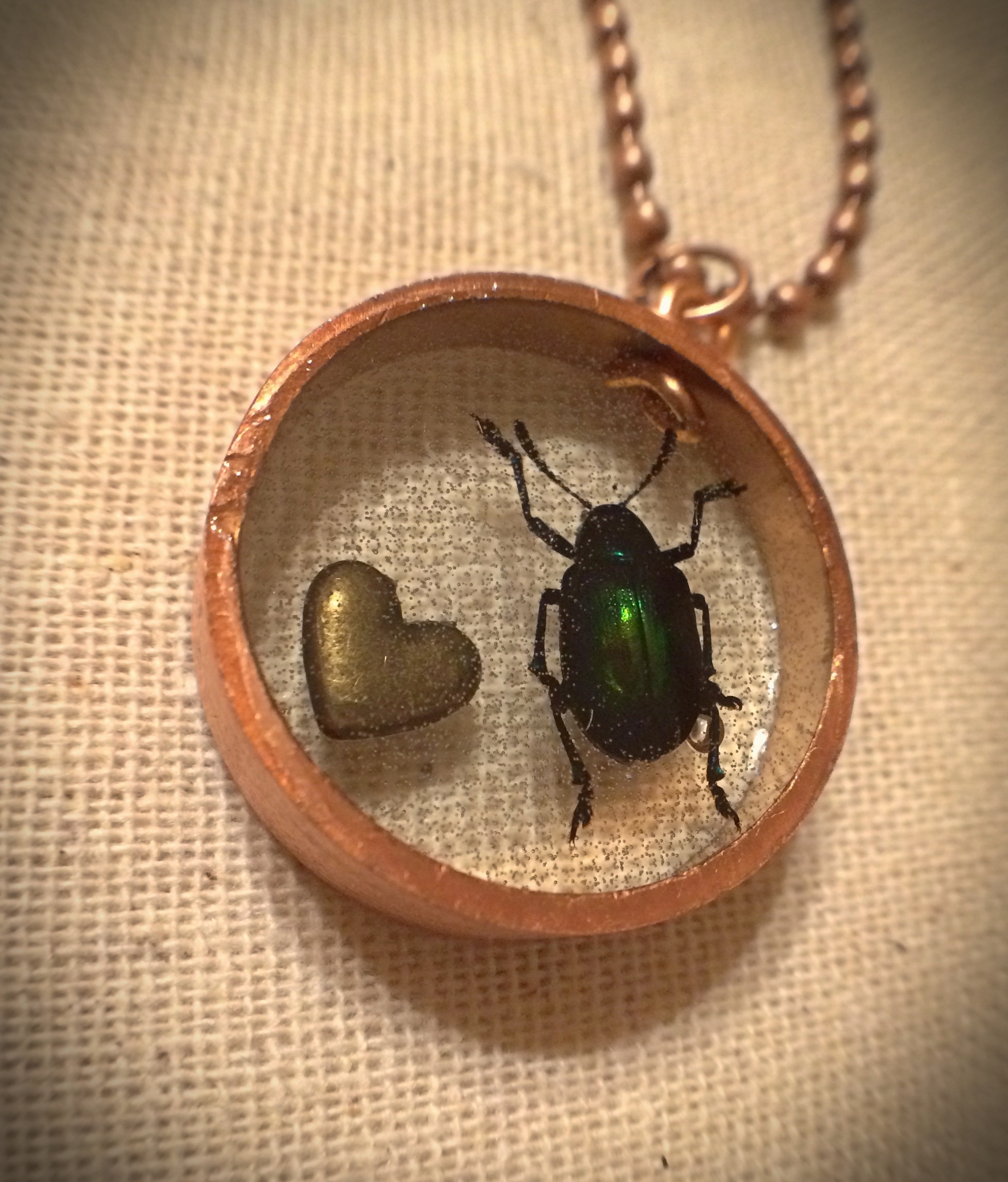 Resin 'locket' with beetle