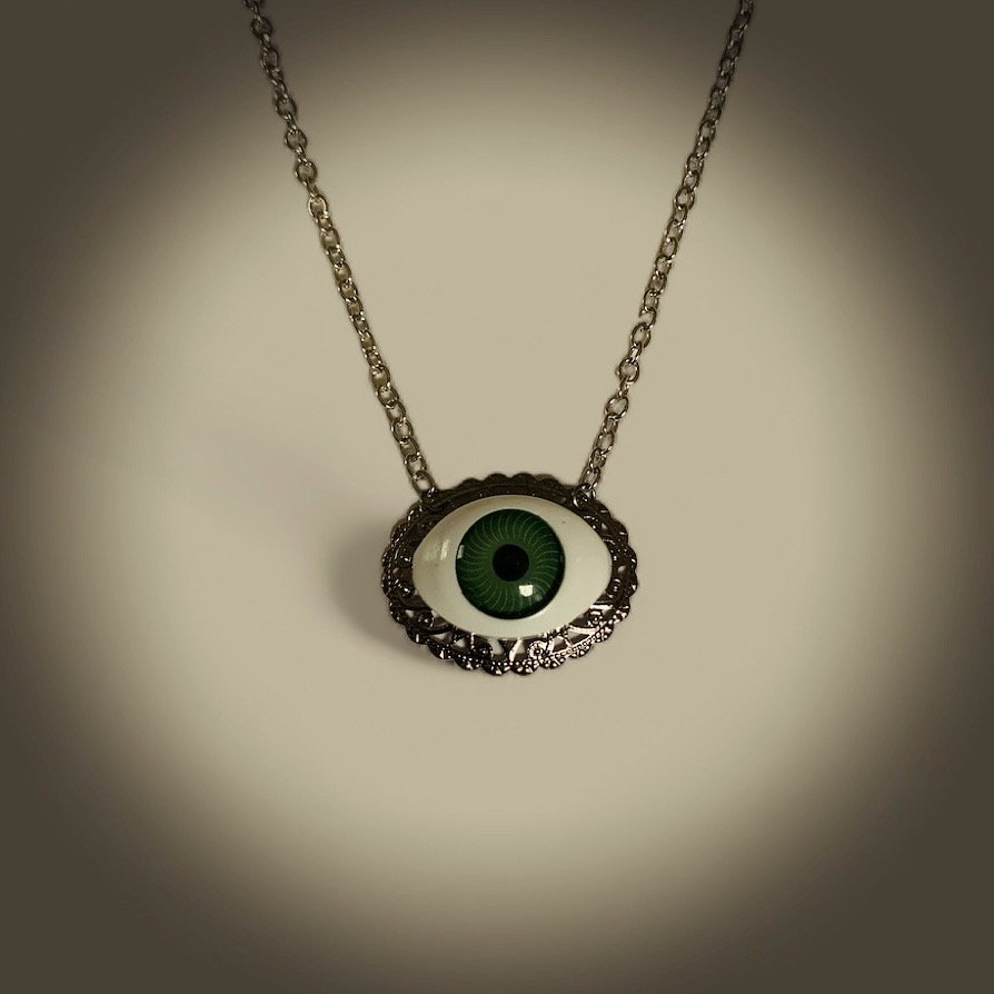 Vintage doll eye necklace