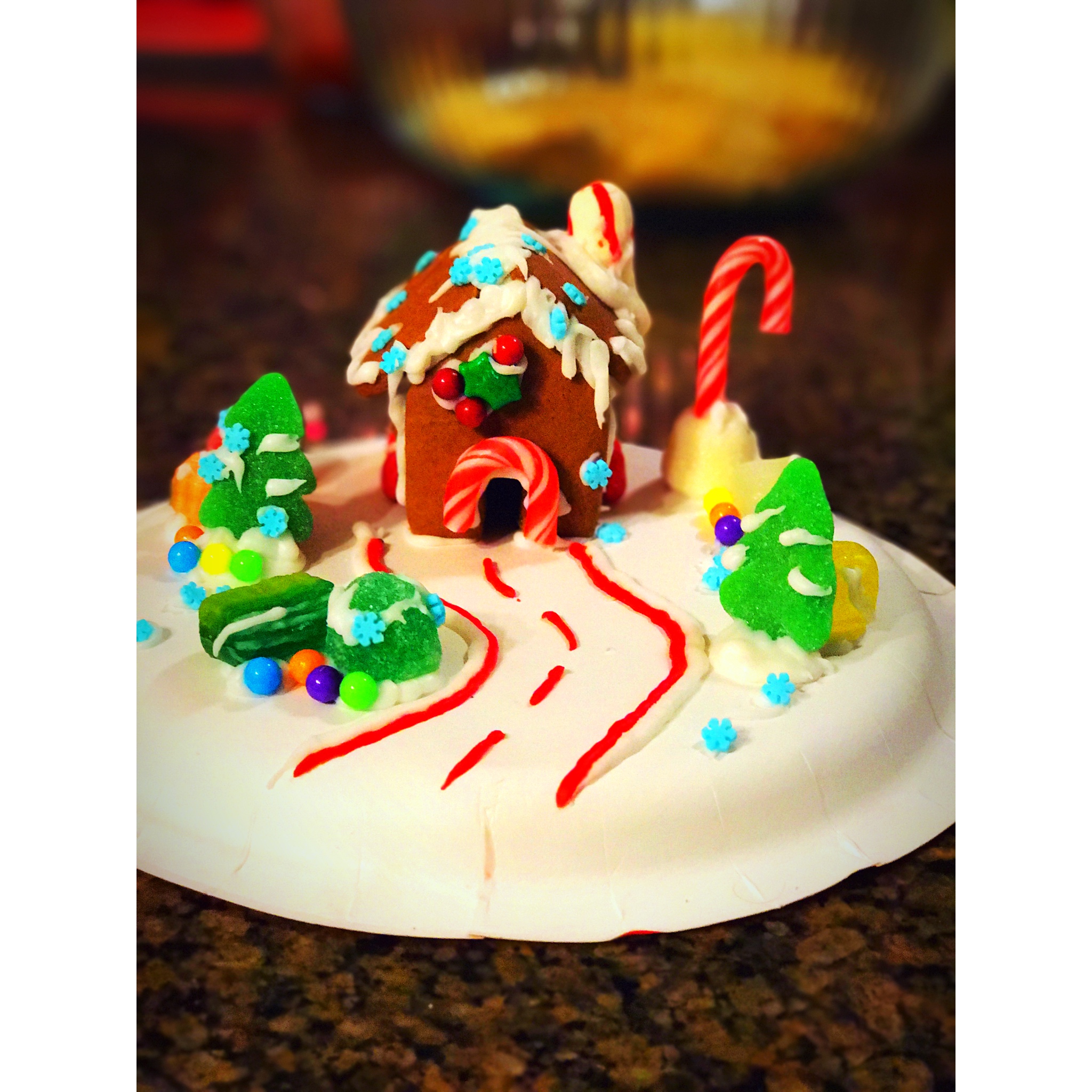 Tiny gingerbread house on wheels