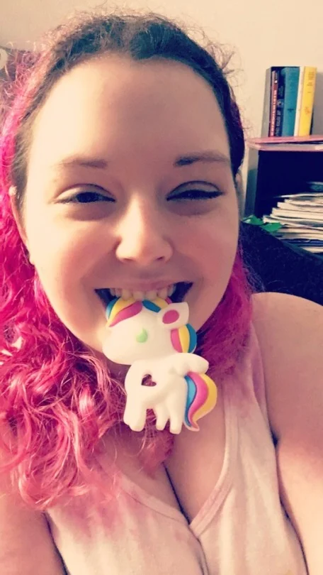 Morgan, with a chewable unicorn