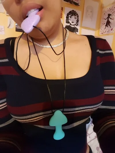 A, with two chewable mushroom pendants