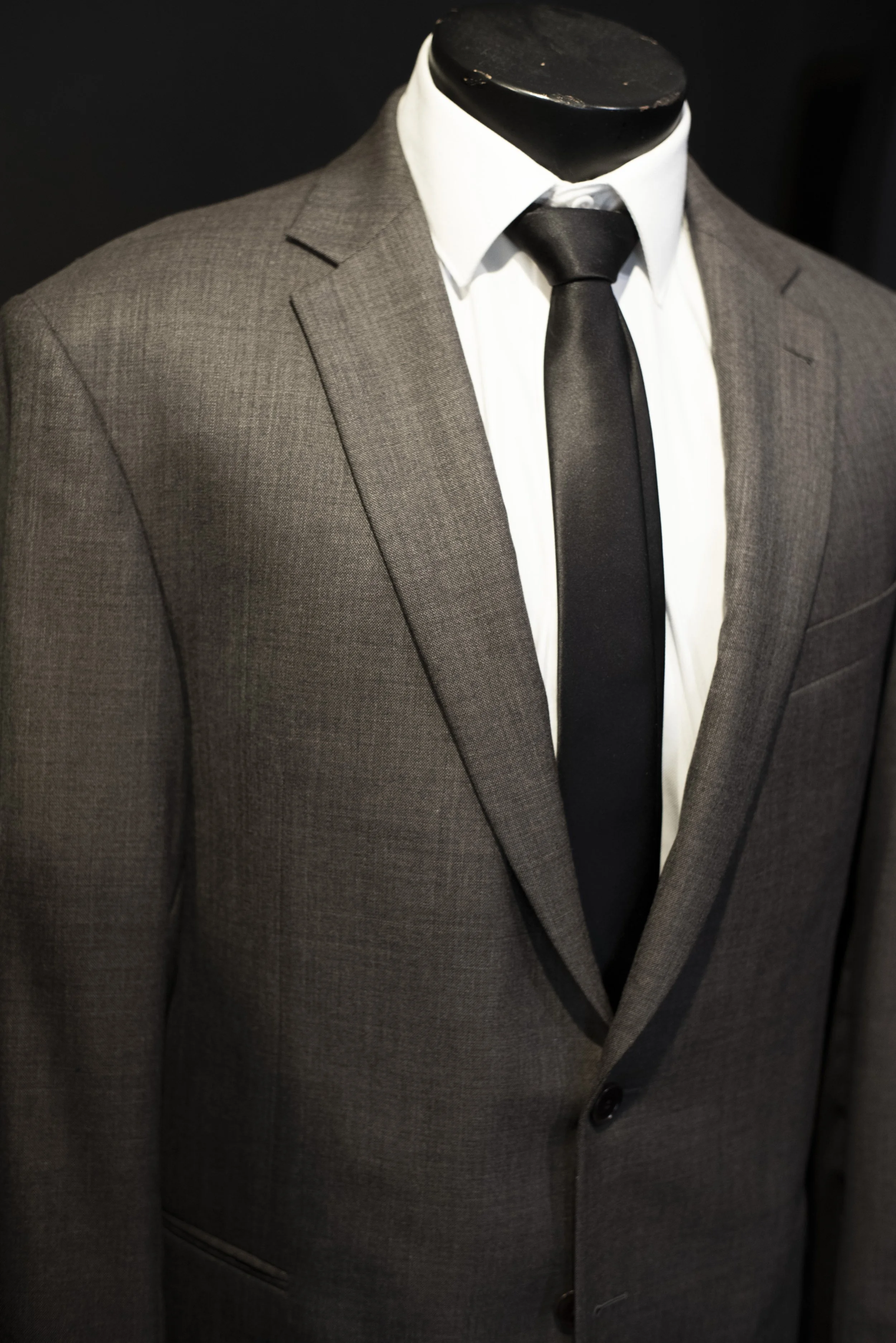 Medium Dark Gray Oaklawn Grey Suit for Rental in Tampa. Great for weddings, prom, homecoming and exclusively available for rent at Bib 'N Tux.