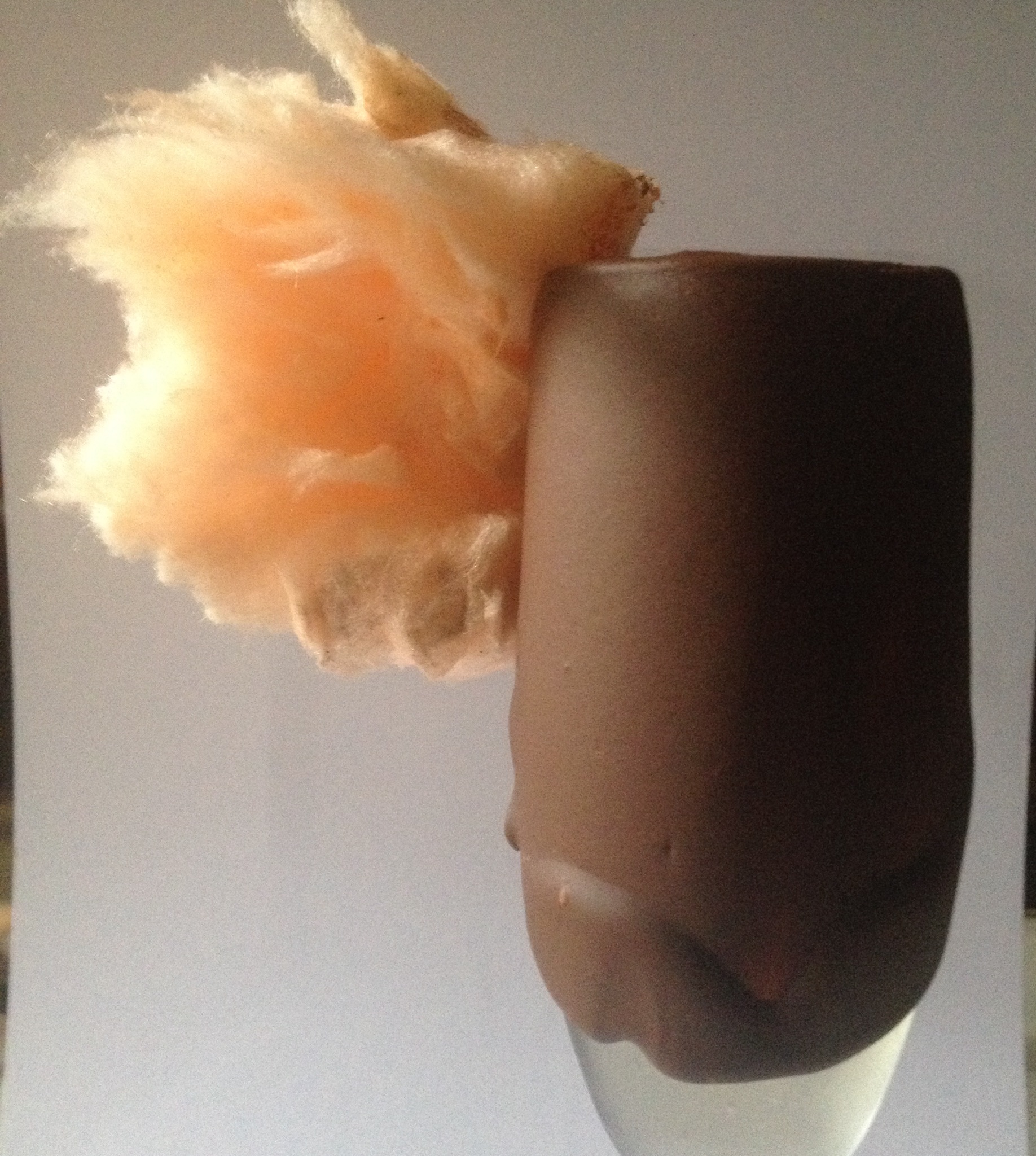 Upgrade your chilled glass with a quick dip in chocolate and garnish with cotton candy!