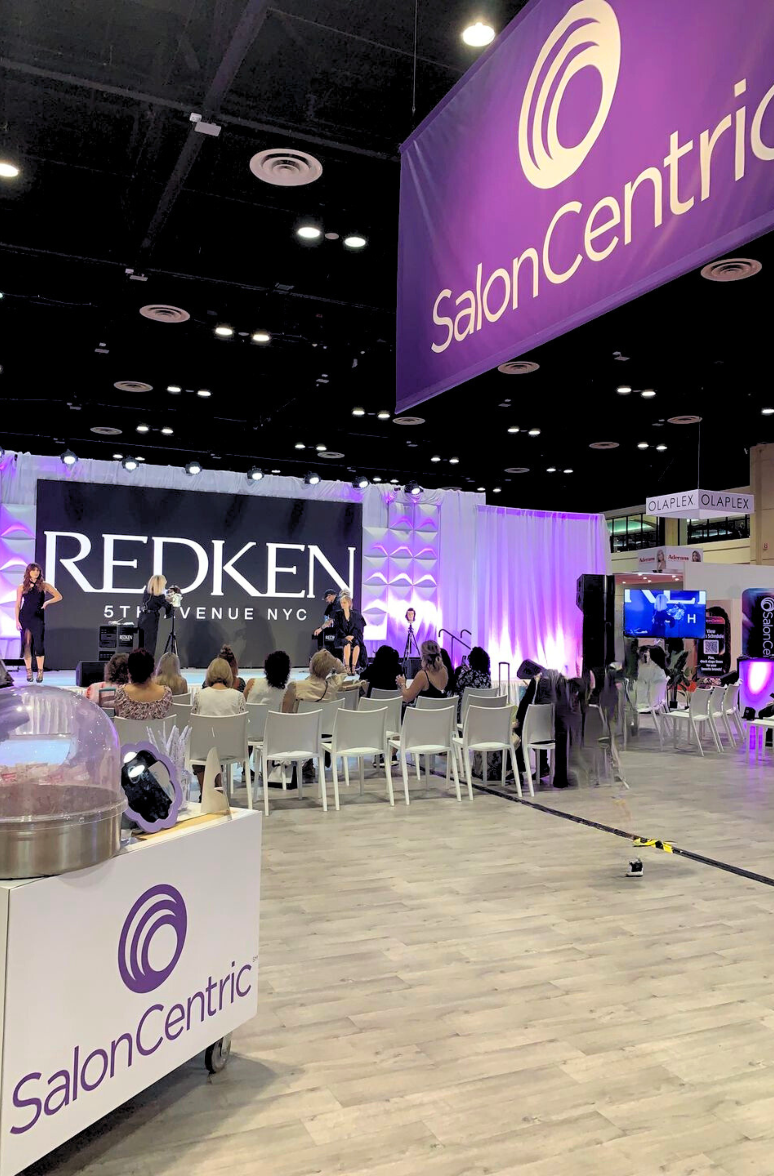 A cotton candy cart inside a tradeshow booth at the Orange County Convention Center