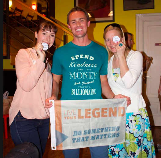 This picture warms my heart: Scott proudly wearing the T-shirt that I designed for him and his LYL community and holding a flag that he intended to hold high above his head after he climbed Mt. Kilimanjaro with his wife Chelsea. 