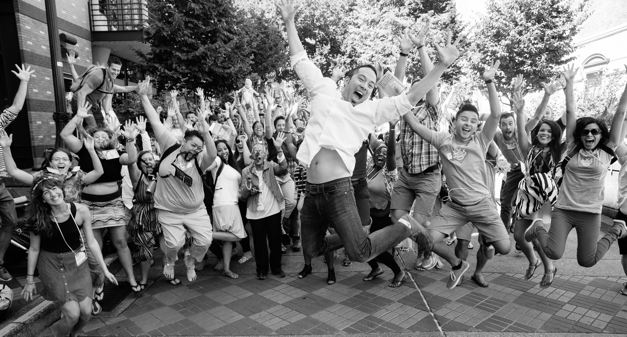 This photo exemplifies how I feel about attending World Domination Summit in Portland, Oregon. It features the WDS Concierge Jedd Chang jumping for joy with friends. Photo credit: Armosa Studios