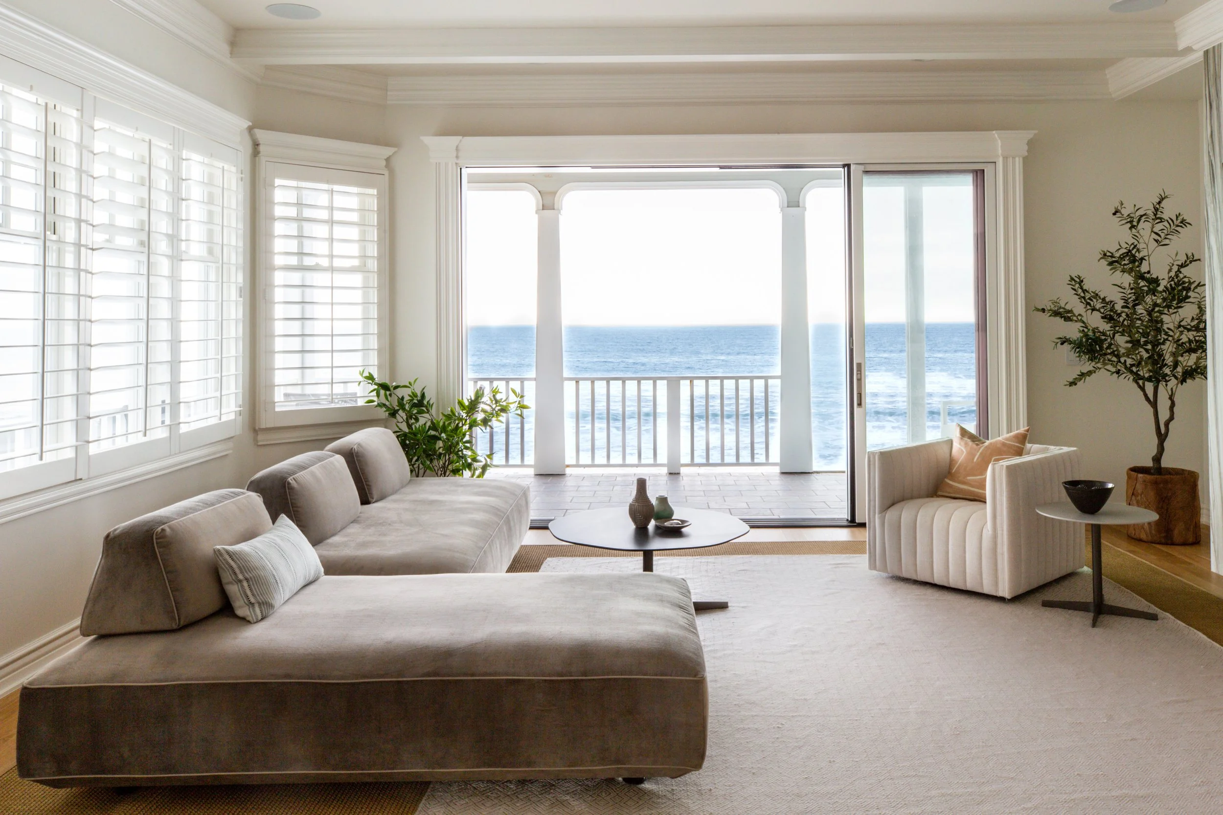 Modern coastal living room with ocean views in Malibu.