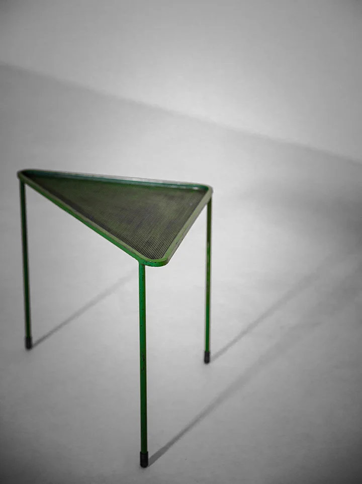  Mathieu Matégot ‘Triangle’ occasional table steel, brass, original paint France, 1953 literature:  Mathieu Matégot , Jousse Enterprise, “Photographies d’archives: 1945-1960”  sold     