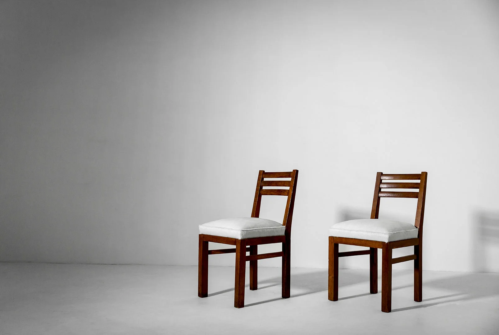  André Arbus side chairs, pair oak, hide France, 1940s literature:  Le Décor d'aujourd'hui , no. 42, 1948 