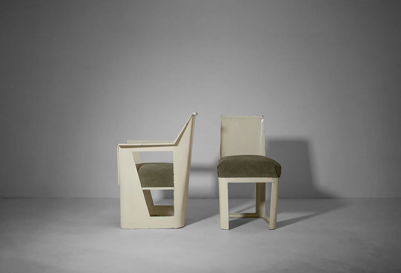  René Prou metal chairs, set of two lacquered steel, suede France, c. 1932 literature:&nbsp; Les Années 30 , Anne Bony, 1987, p. 899;&nbsp; Art Déco: Les maîtres du mobilier - Le décor des paquebots ,&nbsp;Pierre Kjellberg, 2000, p. 190 