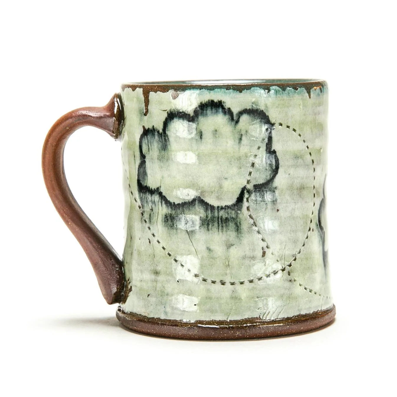 Mug: Red Stoneware with slip and underglaze. ^5 Oxidation