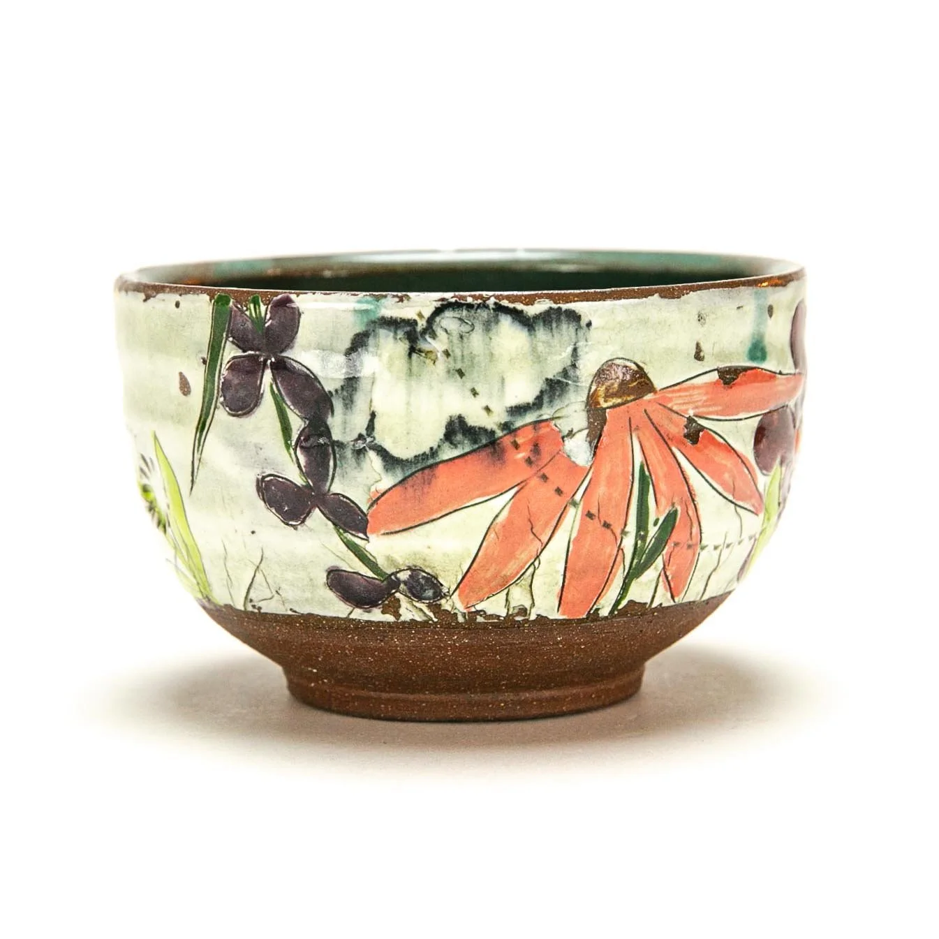 Tea Bowl: Red Stoneware with slip and underglaze. ^5 Oxidation