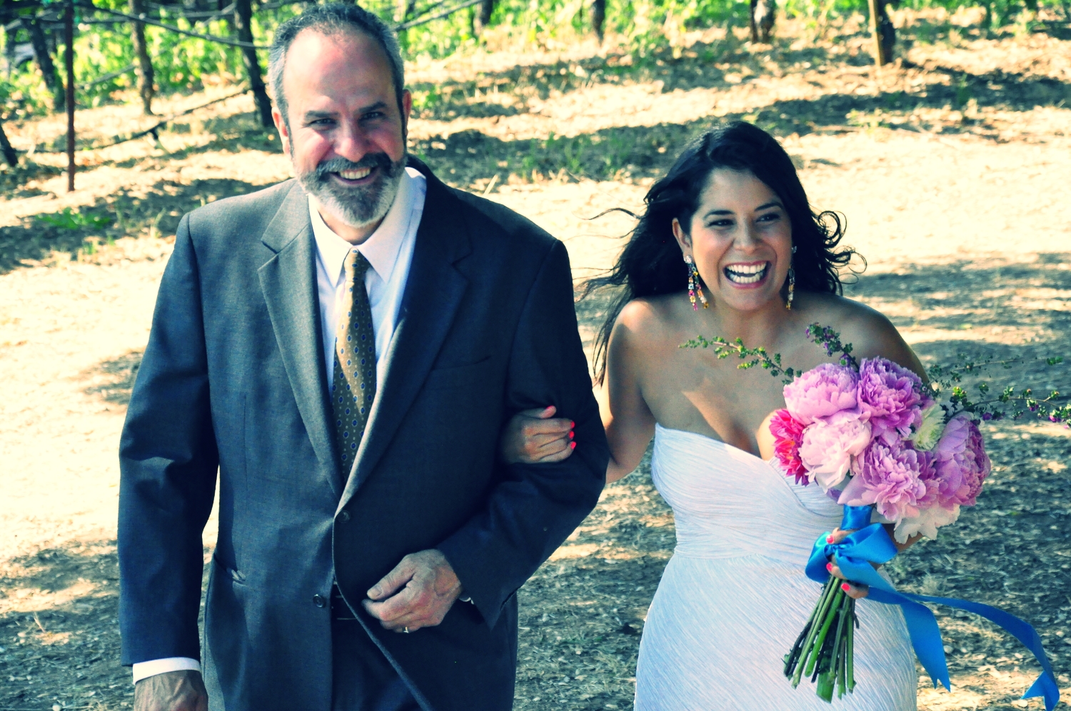My dad walking me down the aisle.