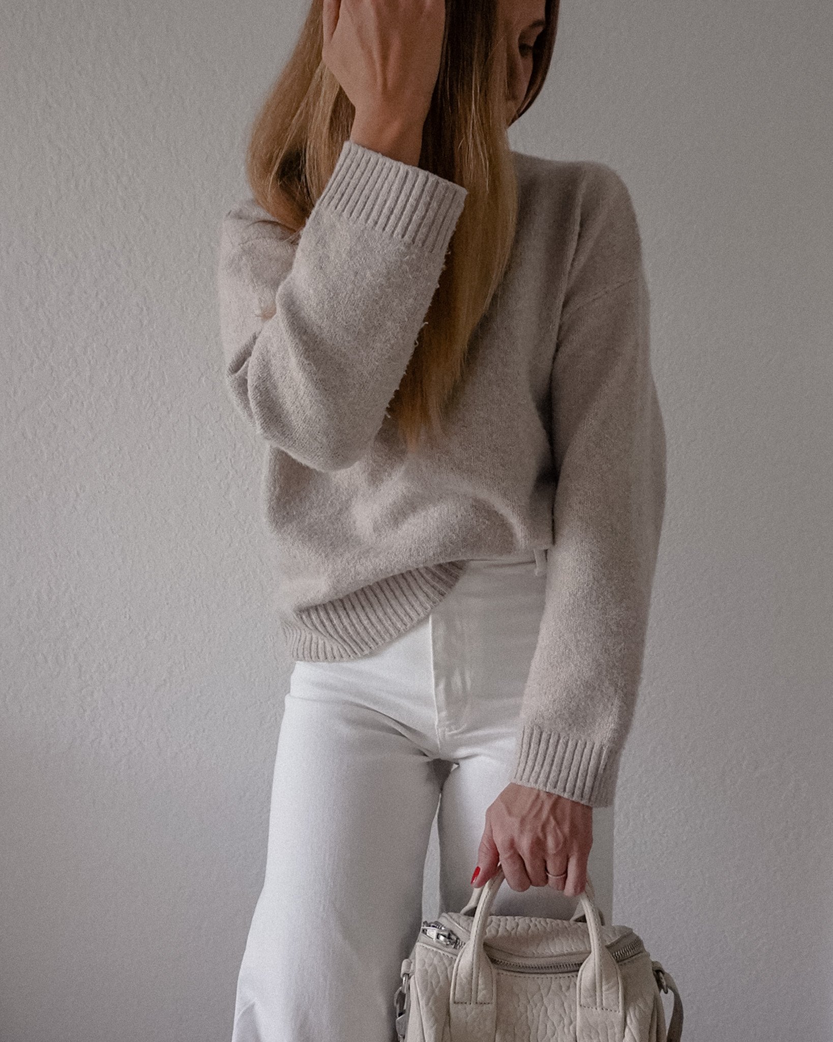  hellojessicashley wearing ZARA ecru high waist pants, Nordstrom sweater with Alexander Wang Rockie handbag, showing how to style beige off-white pants for a classic look 