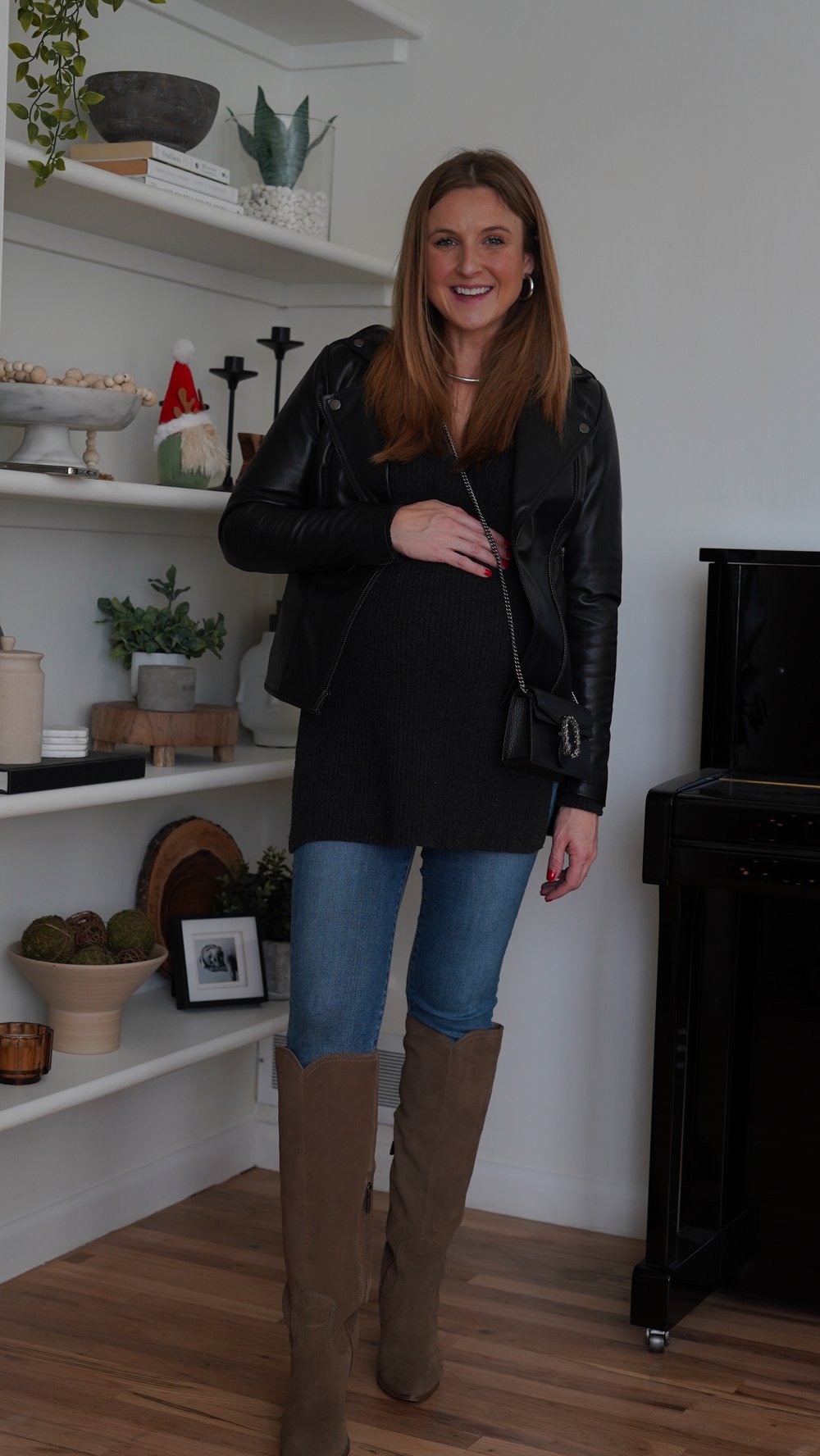  Jessica Ashley wears The Jacket Maker Flashback leather jacket in size XS with JBrand maternity denim,  Blondo suede boots, grey sweater tunic and Gucci Dionysus small cross body bag | best leather jackets for women 