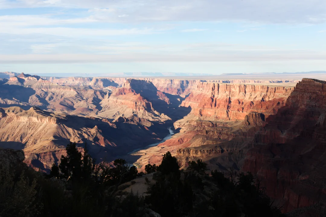 The signature view from Desert View Watchtower . It stroke me as the most heroic interpretation of mid-west America. The lights and shadows at dusk formed the flowing symphony dedicated to the vivid portrait of life and battle.