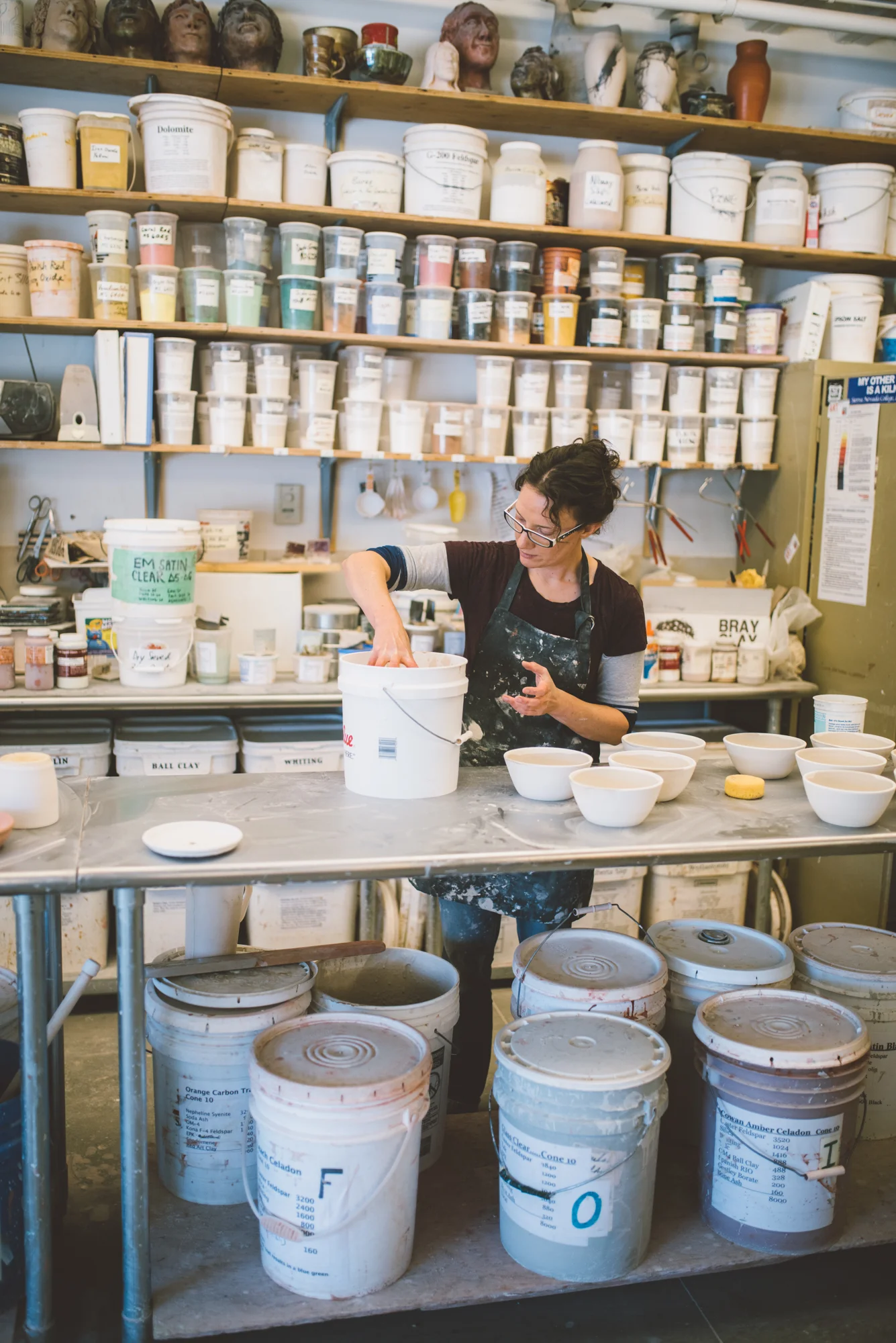 Jenny glazing in the Art Association Studio, photo by Camrin Dengel