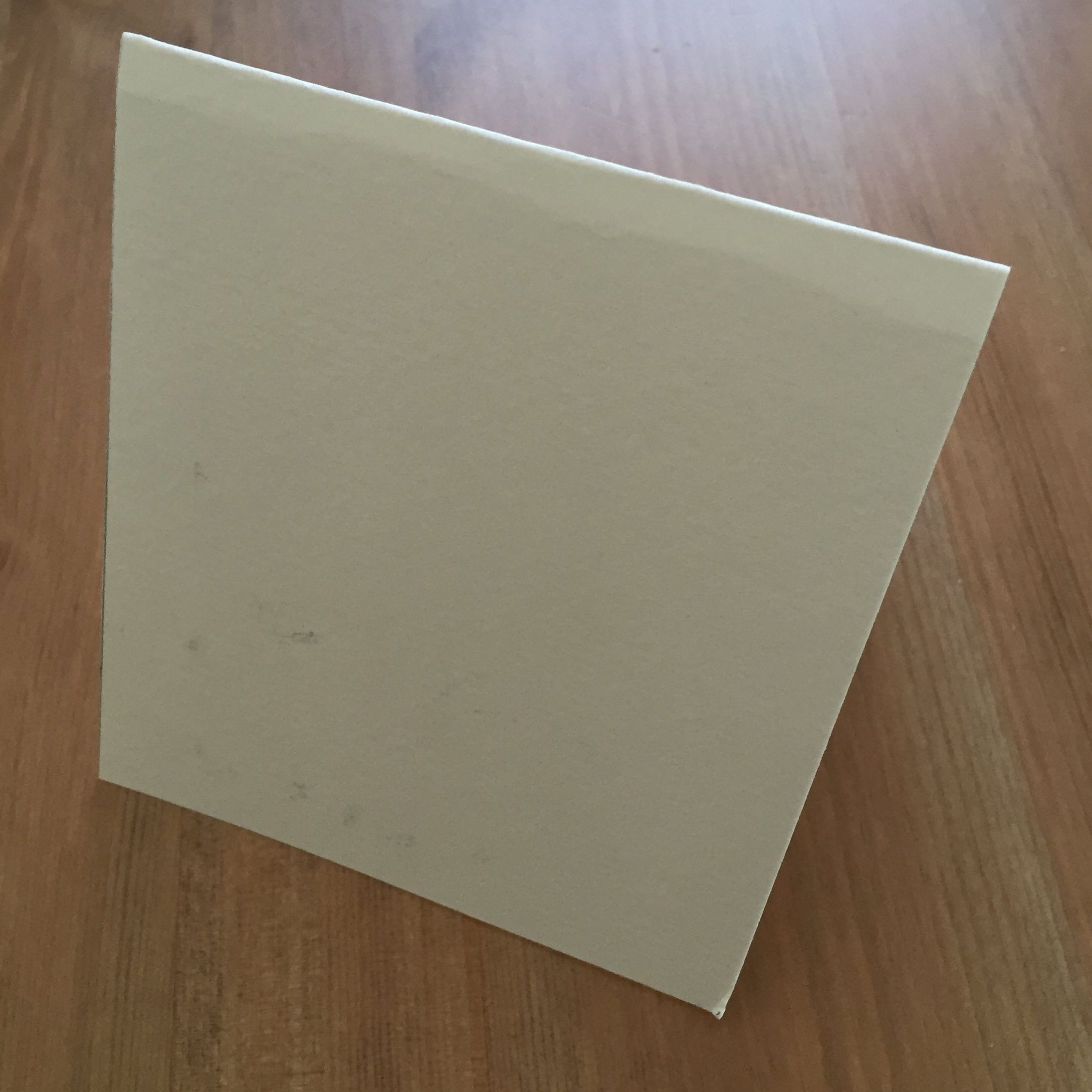 This is an 3 x 6 piece of water color paper folded in half, standing up on it's own.