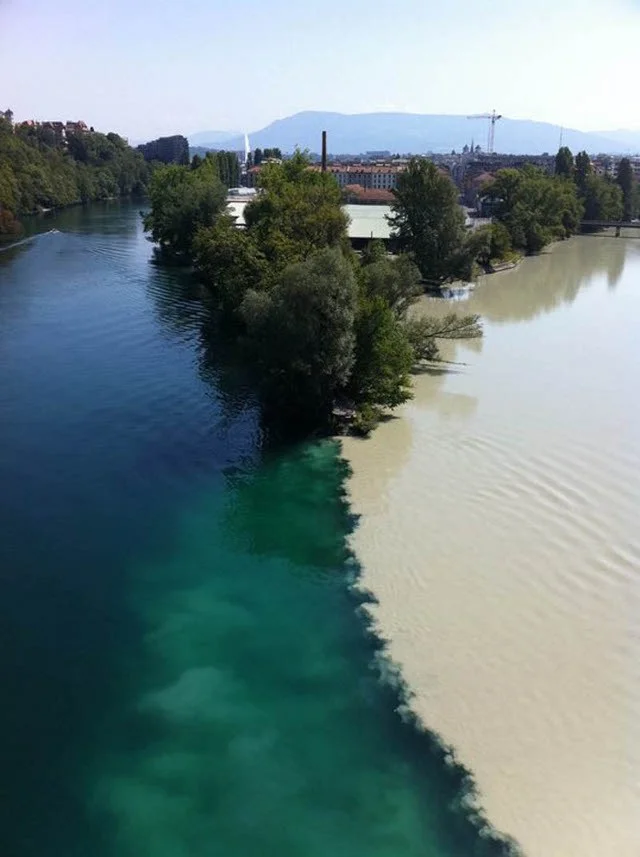 RHONE RIVER MEETS ARVE RIVER, ARVE IS FED BY GLACIERS, WHILE RHONE IS FED BY A LAKE