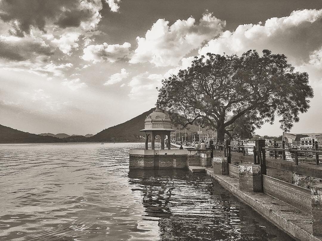Sit Out, part ii .
.
.
.
.
#nature #lake #sunset #blackandwhite #india #udaipur #contrast #iphoneonly #iphone6splus #iphoneasia #contrast #beautiful #calm #cloudy #picoftheday #photooftheday #bnw #blacknwhite #tree #architecture