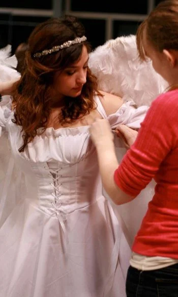 Putting the angel's wings on for, "Just"