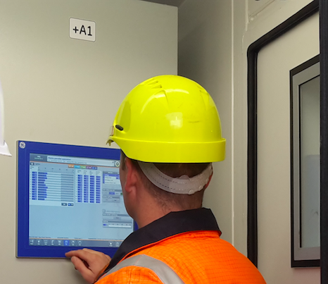 Man looking at controls.png