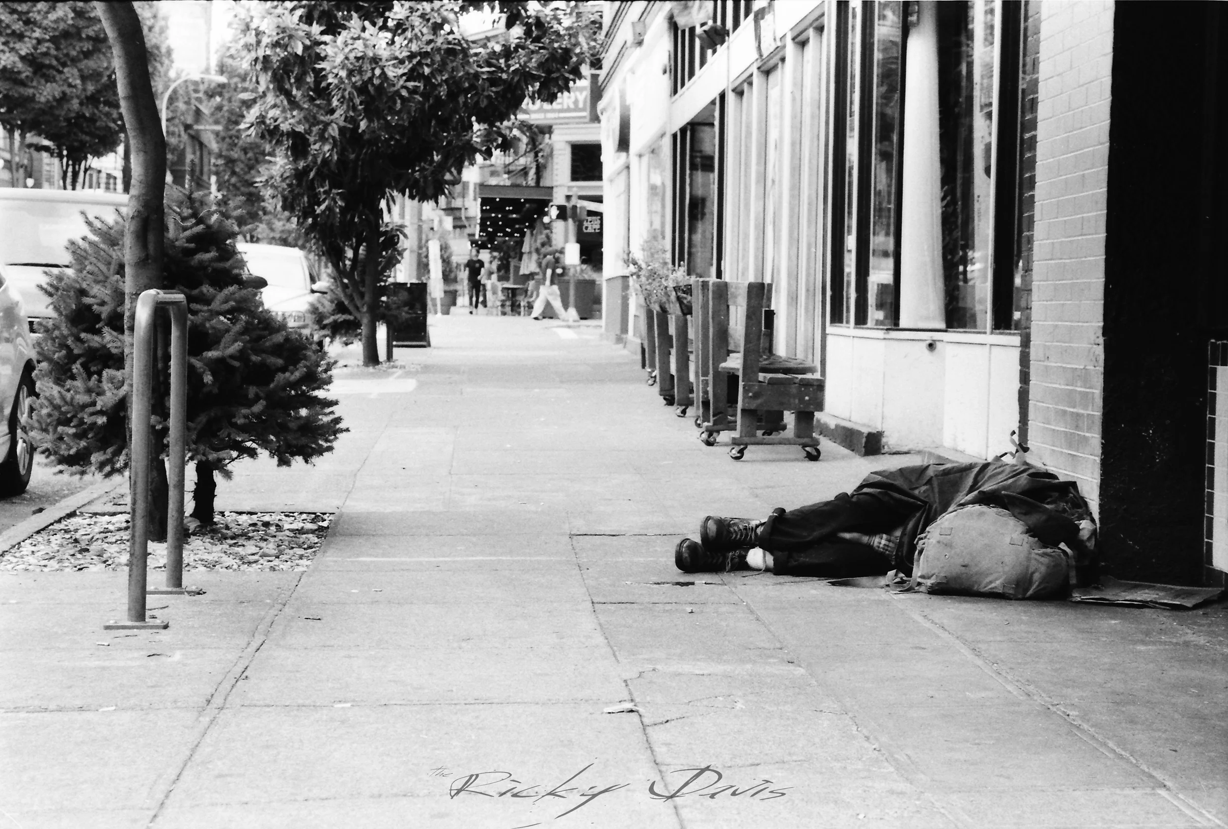 Homeless girl sleeping on the sidewalk - Portland, OR - Photographer Ricky Davis of TRD Photography - Ilford 400 HP5 Film