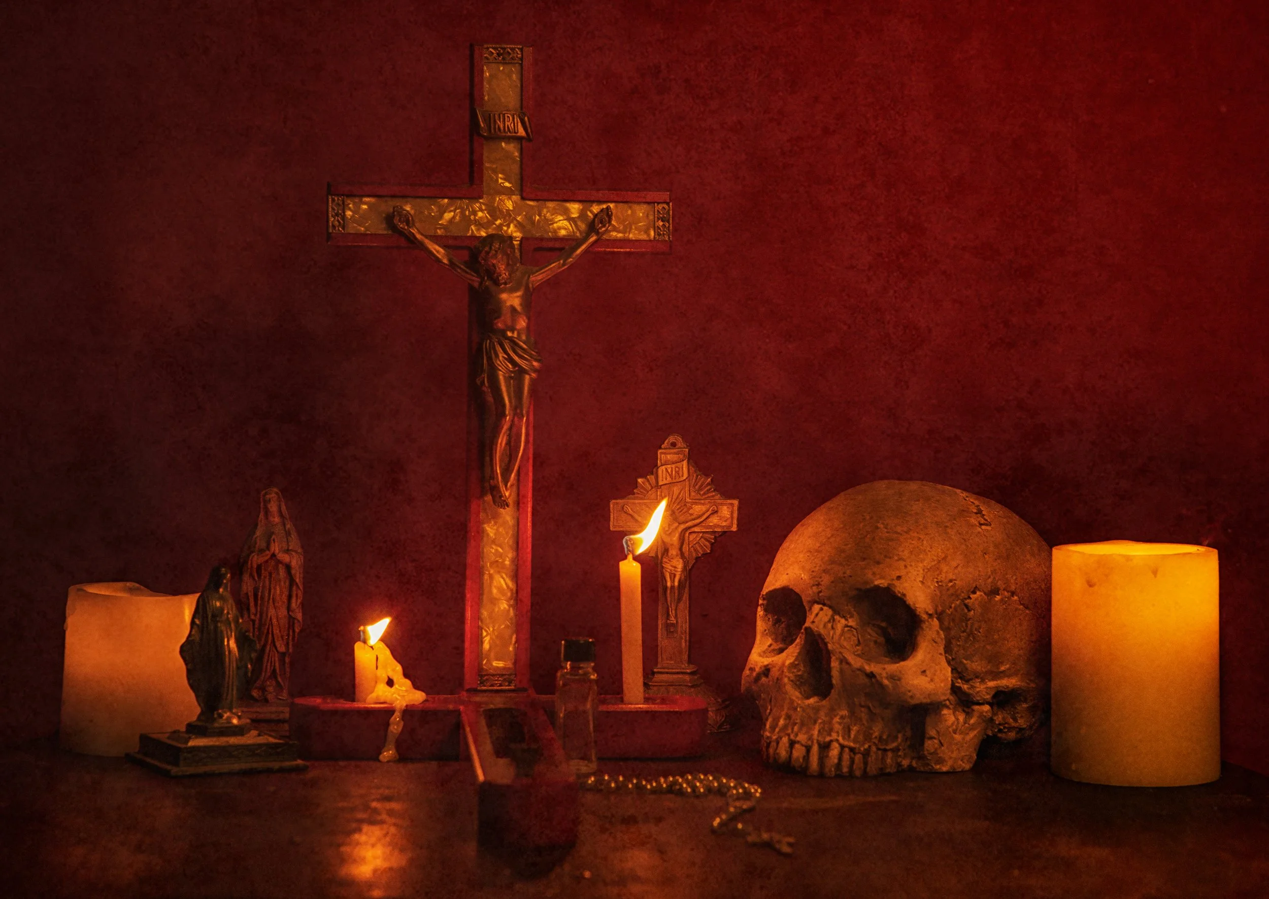 Gothic Still Life photography of a skull, candles, and a crucifix - Dark Academia Still Life Photography - Dark Academia Photography - Photo by photographer Ricky Davis of TRD Photography in Chattanooga, TN