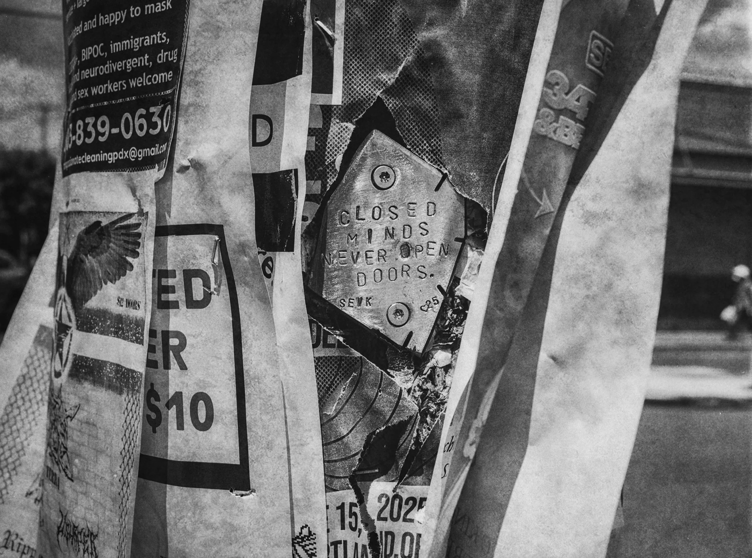 "Closed Minds Never Open Doors" plaque on lightpole - Street Art - Portland, Oregon
Kodak Tri X Film Photography
Photographer Ricky Davis of TRD Photography