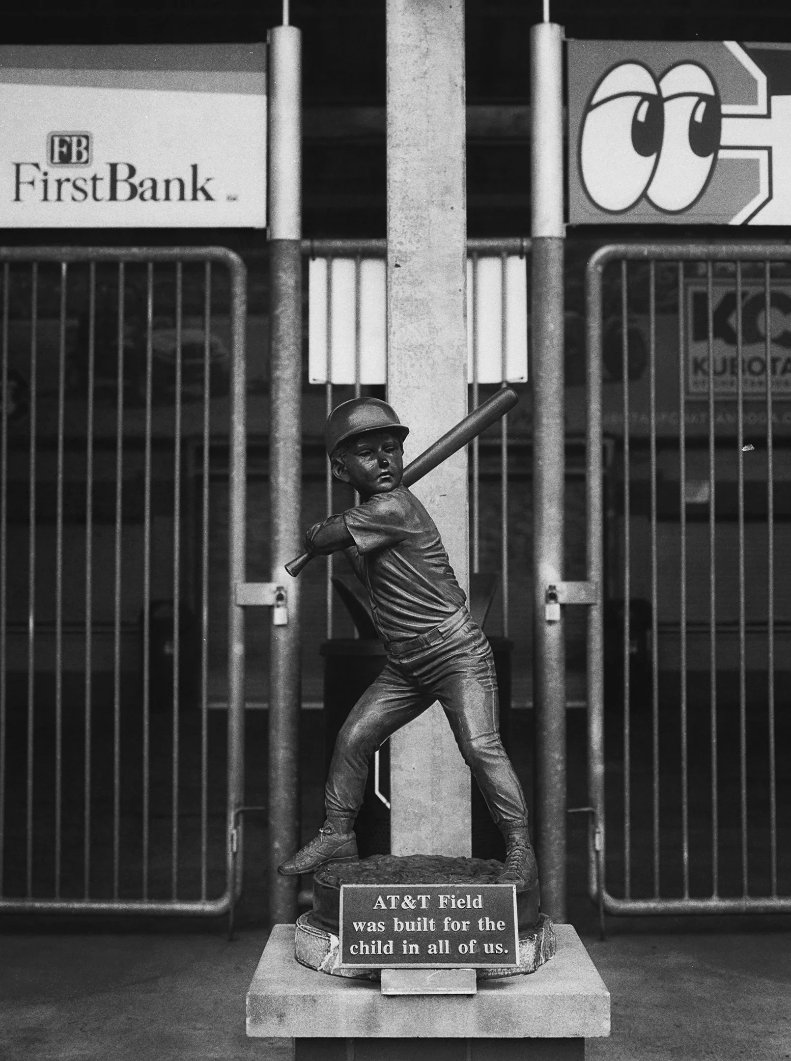 Statue of child batter outside of AT&T Field - Home of the Chattanooga Lookouts in Chattanooga, TN. B&W Kodak Tri X Film Photography - Ricky Davis of TRD Photography