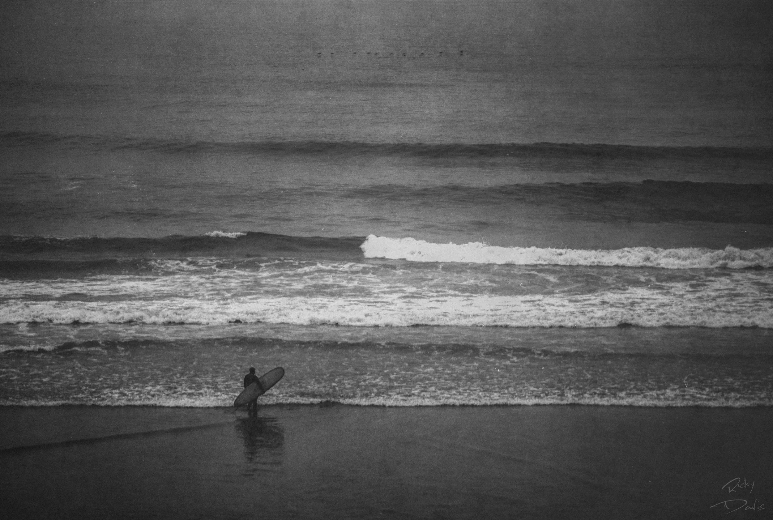 Surfer at Indian Beach at Ecola State Park - 
Cannon Beach, Oregon
Kodak Tri X Film Photography
Photographer Ricky Davis of TRD Photography