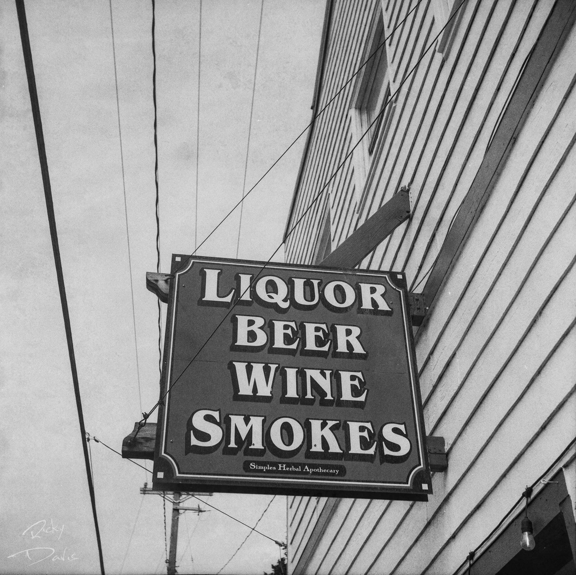 Liquor Beer Wine Smokes Sign - Oregon Coast Store 
Kodak Tri X Film Photography
Photographer Ricky Davis of TRD Photography