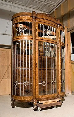 This china cabinet has been completely restored and updated with glass shelves and lights. This piece was totally derelict. I was very proud of the final product; we started with so little to work with.