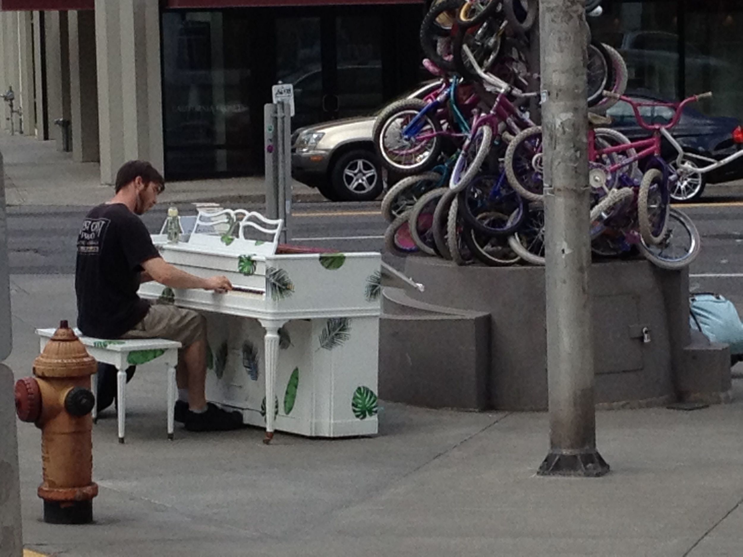 Respite between shows...in Portland, Oregon there are random pianos scattered around town for anyone to play. This spot happened to also have a tiers bicycle totem. 